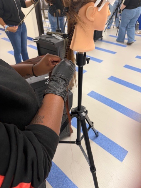 On Monday, Shambrica Creag returned, and the Cosmetology students showcased the braiding techniques she taught them last week.