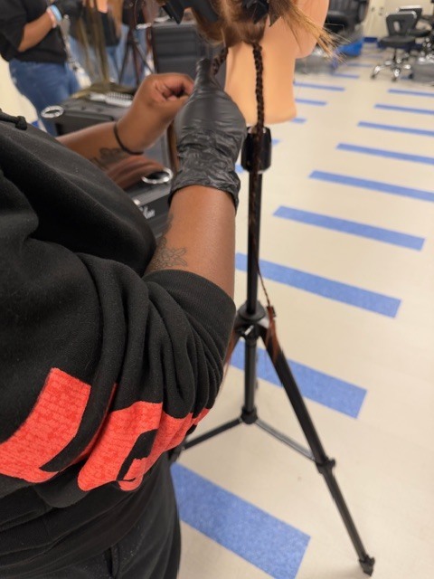 On Monday, Shambrica Creag returned, and the Cosmetology students showcased the braiding techniques she taught them last week.