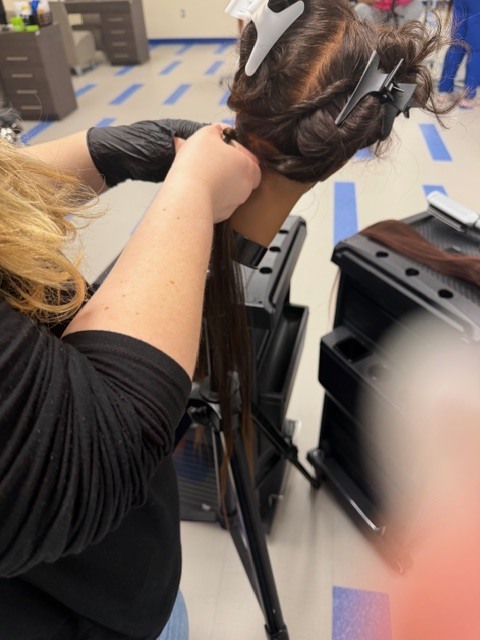 On Monday, Shambrica Creag returned, and the Cosmetology students showcased the braiding techniques she taught them last week.