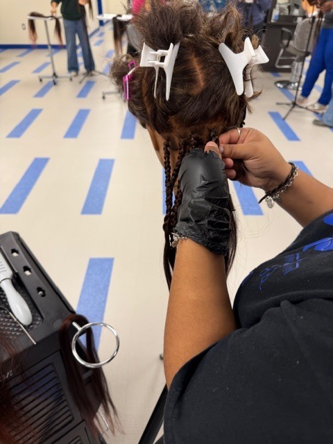 On Monday, Shambrica Creag returned, and the Cosmetology students showcased the braiding techniques she taught them last week.