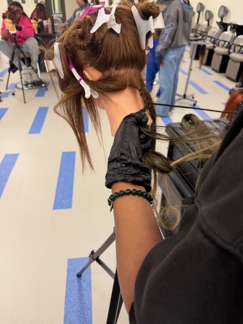 On Monday, Shambrica Creag returned, and the Cosmetology students showcased the braiding techniques she taught them last week.