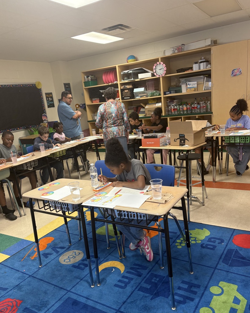 Art day success at Crockett Elementary! 🎨✨ Mr. & Mrs. Fleming joined Mrs. Elmore’s class for a watercolor workshop where students explored primary and secondary colors and created colorful balloons, a giraffe, and a fish. Proud of these young artists!