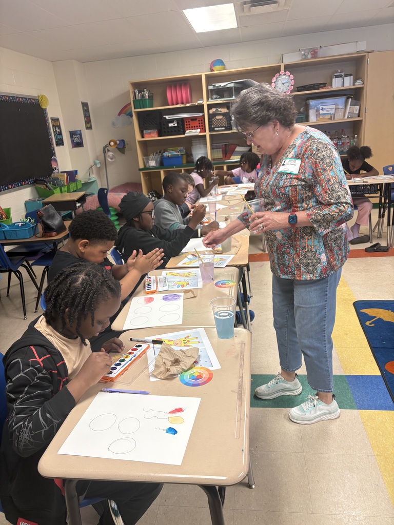 Art day success at Crockett Elementary! 🎨✨ Mr. & Mrs. Fleming joined Mrs. Elmore’s class for a watercolor workshop where students explored primary and secondary colors and created colorful balloons, a giraffe, and a fish. Proud of these young artists!
