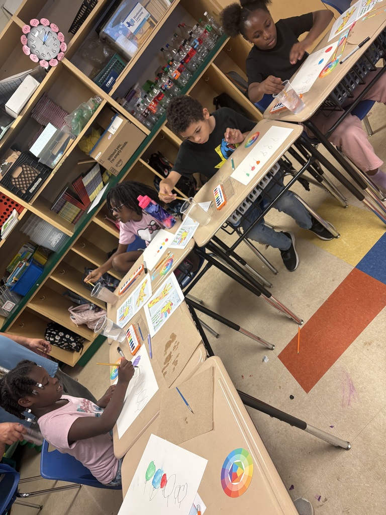 Art day success at Crockett Elementary! 🎨✨ Mr. & Mrs. Fleming joined Mrs. Elmore’s class for a watercolor workshop where students explored primary and secondary colors and created colorful balloons, a giraffe, and a fish. Proud of these young artists!