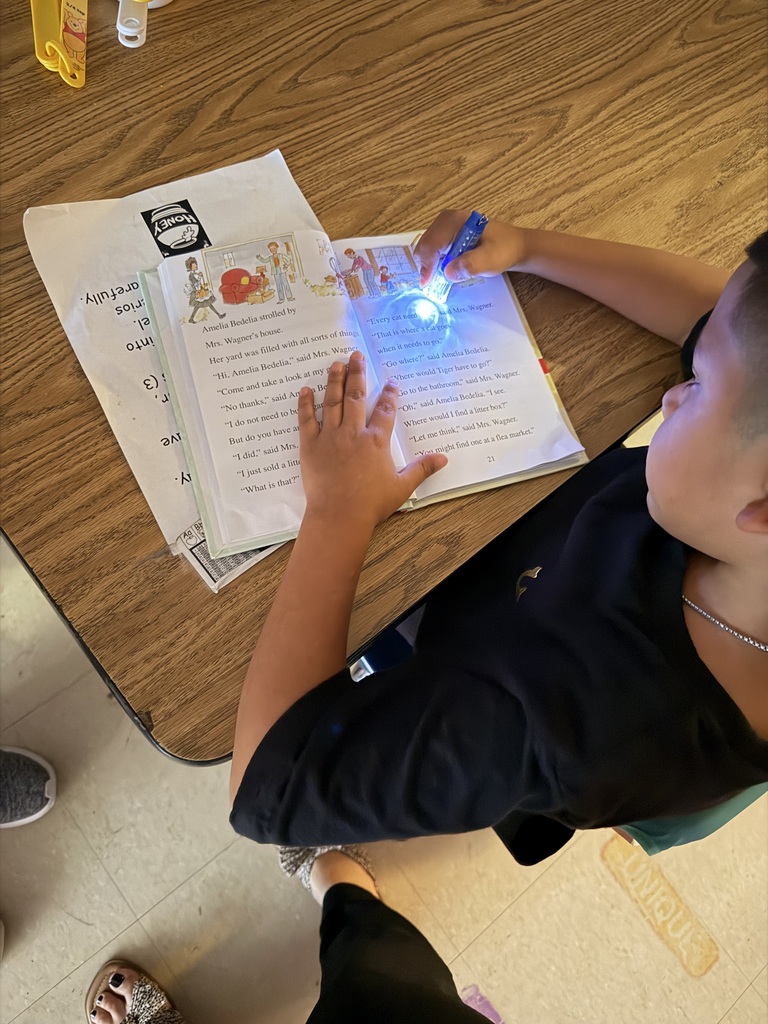 📚💙 NATIONAL READING DAY FUN AT CROCKETT ELEMENTARY! 💙📚  Yesterday was National Reading Day, and our Bulldogs celebrated by diving into their favorite stories and discovering new ones. We wrapped up the day with a campus‑wide dark‑out flashlight reading — the perfect cozy ending to a day full of imagination and adventure.