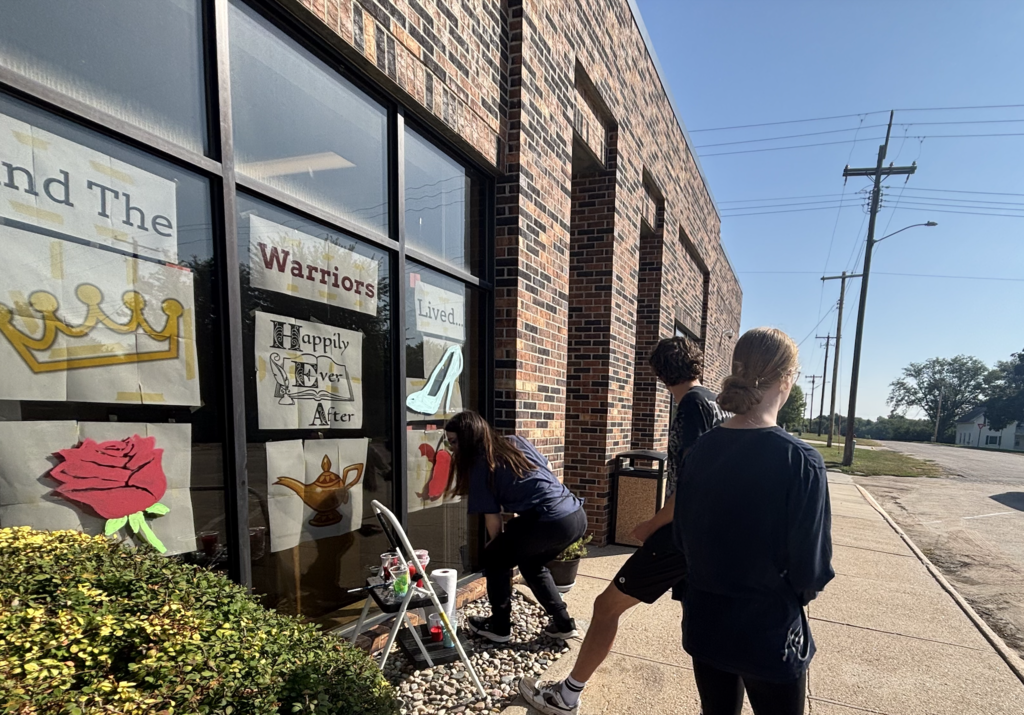 Brooklynn, Lukas, and Charles at the bank