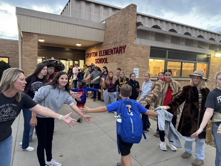 One-Act giving out high fives