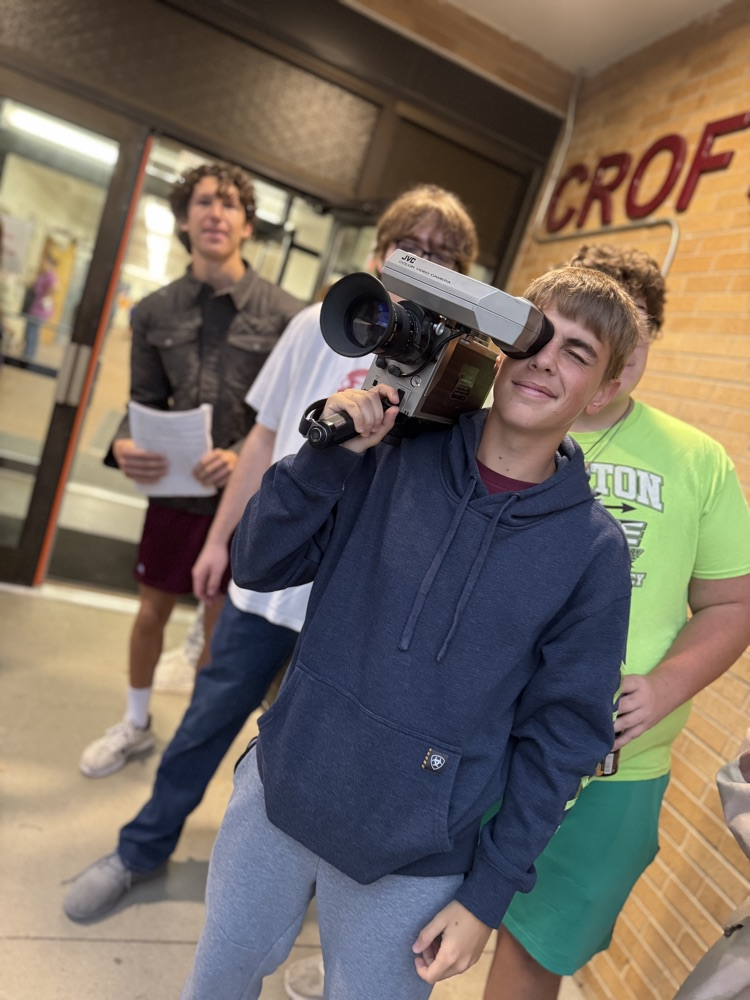 Stufent with camera prop