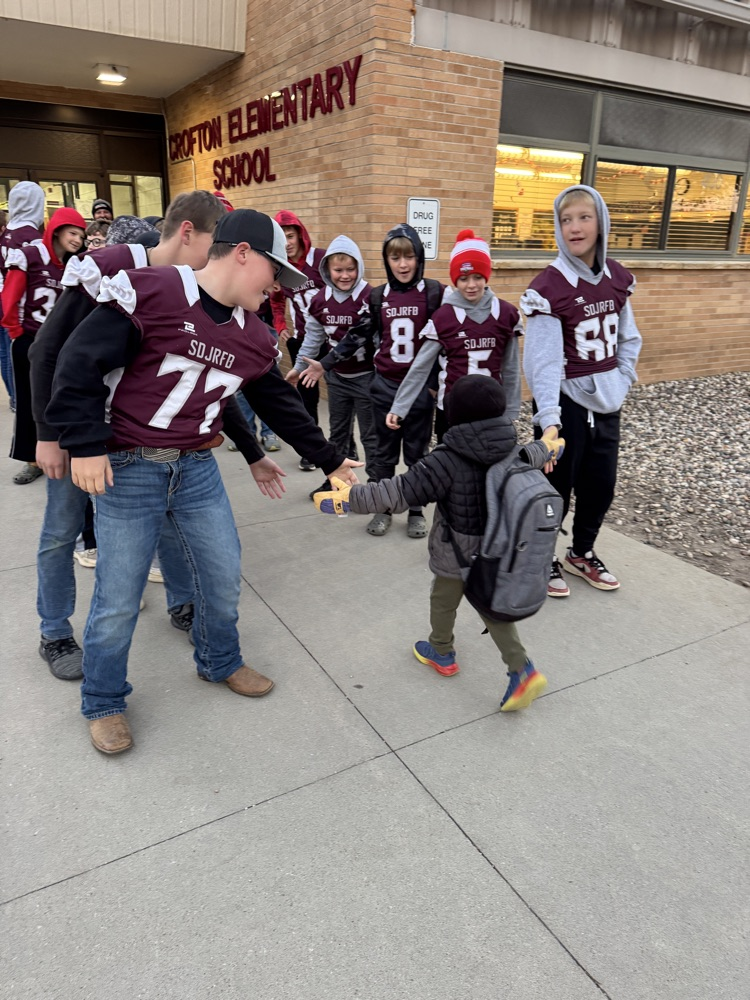 Team giving high fives 