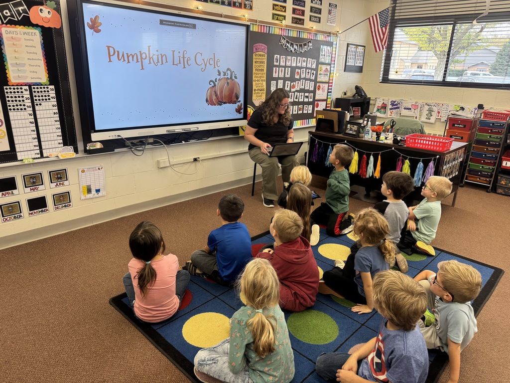 Mrs. O'Brien teaches kindergarten about the pumpkin life cycle.