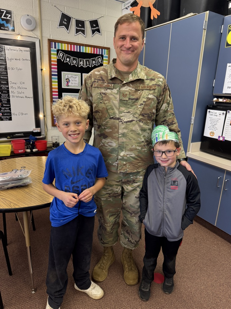 Air Force Veteran Tyler Kleinschmit and his sons