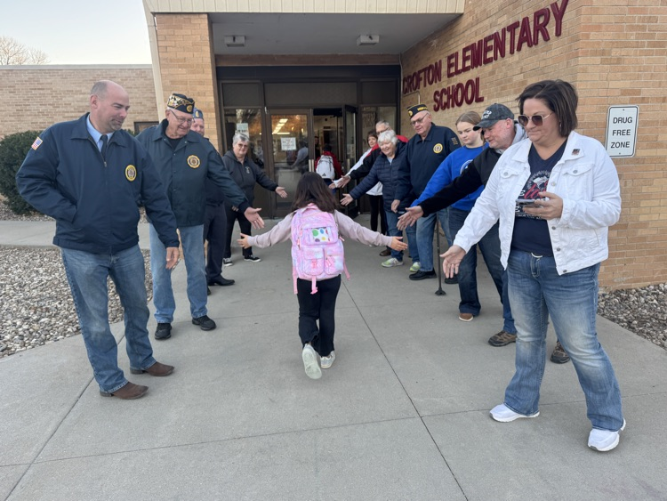 Veterans giving high fives 