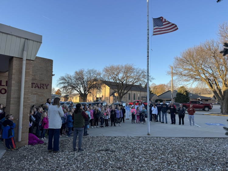 Veterans joining the students for the Pledge of Allegiance 