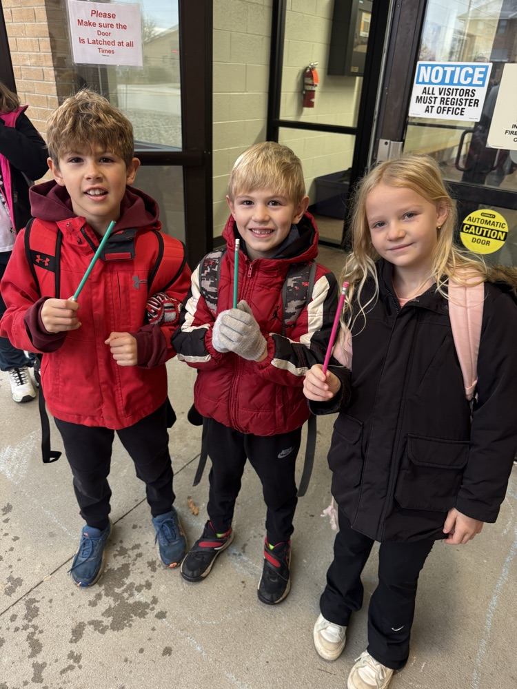 Students with their pencils