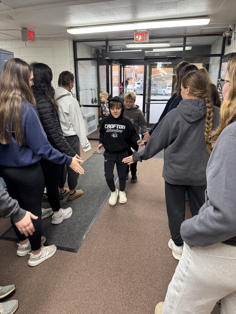 Team giving high fives 