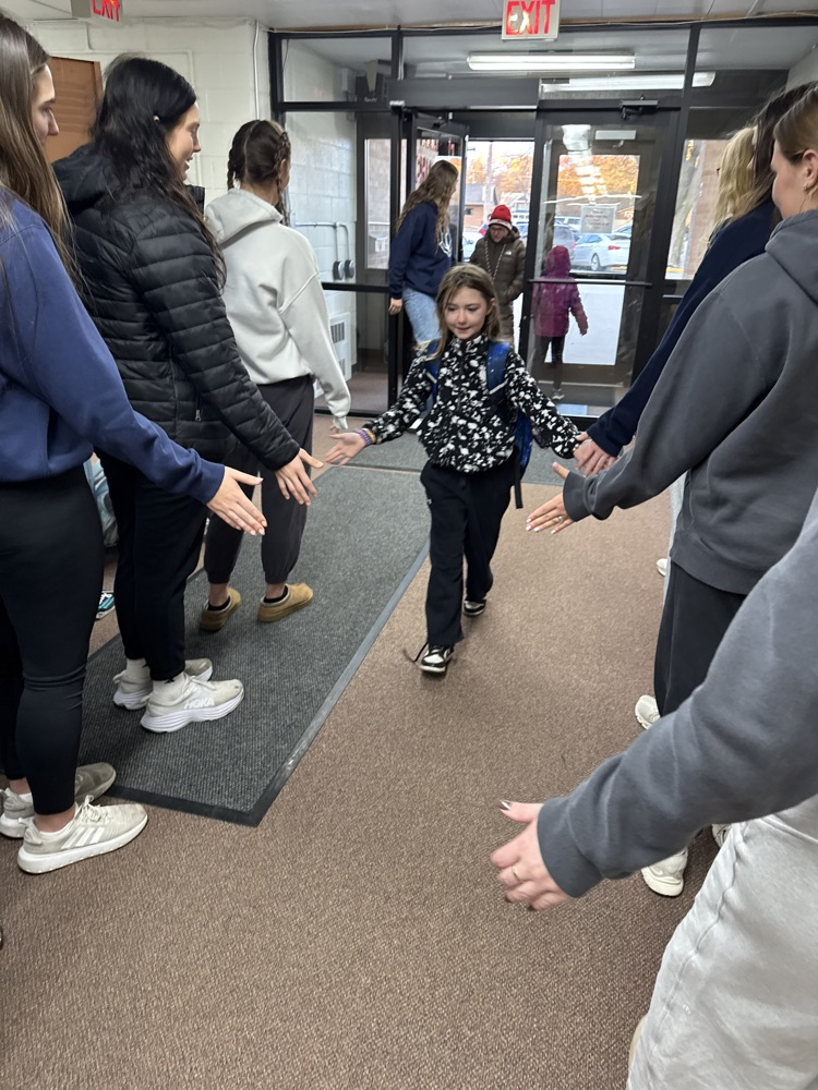 Team giving high fives 
