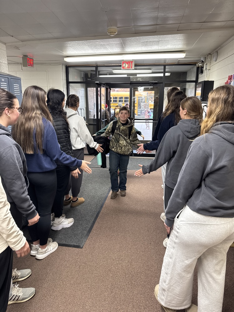 Team giving high fives 