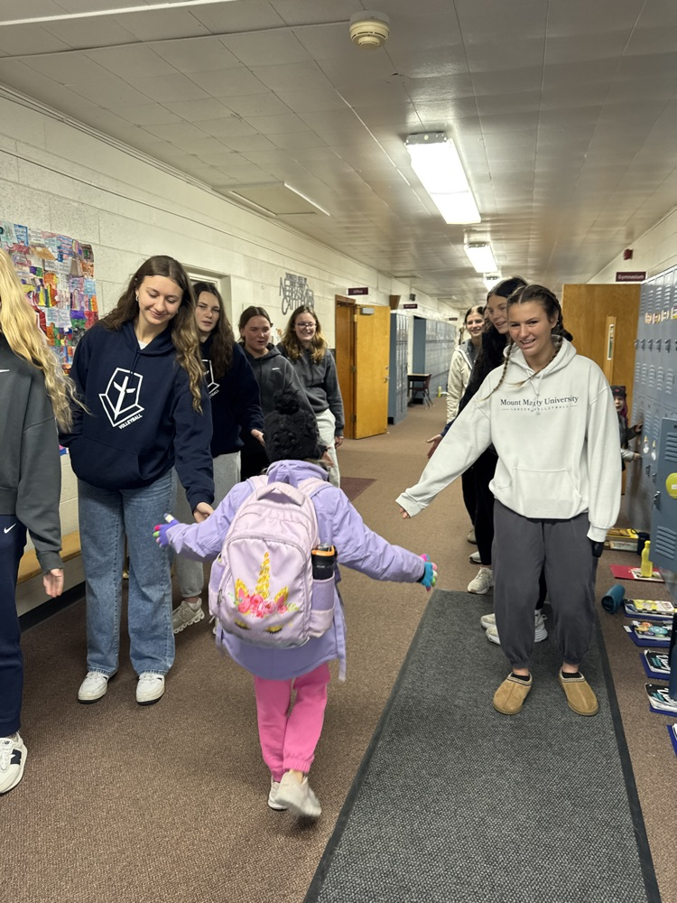 Team giving high fives 