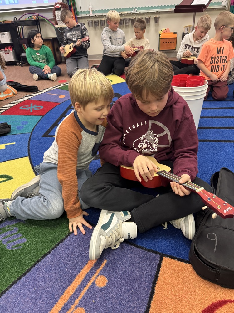 6th graders and Kindergarten students