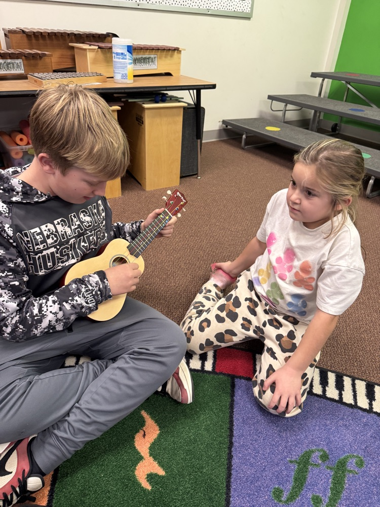 6th graders and Kindergarten students