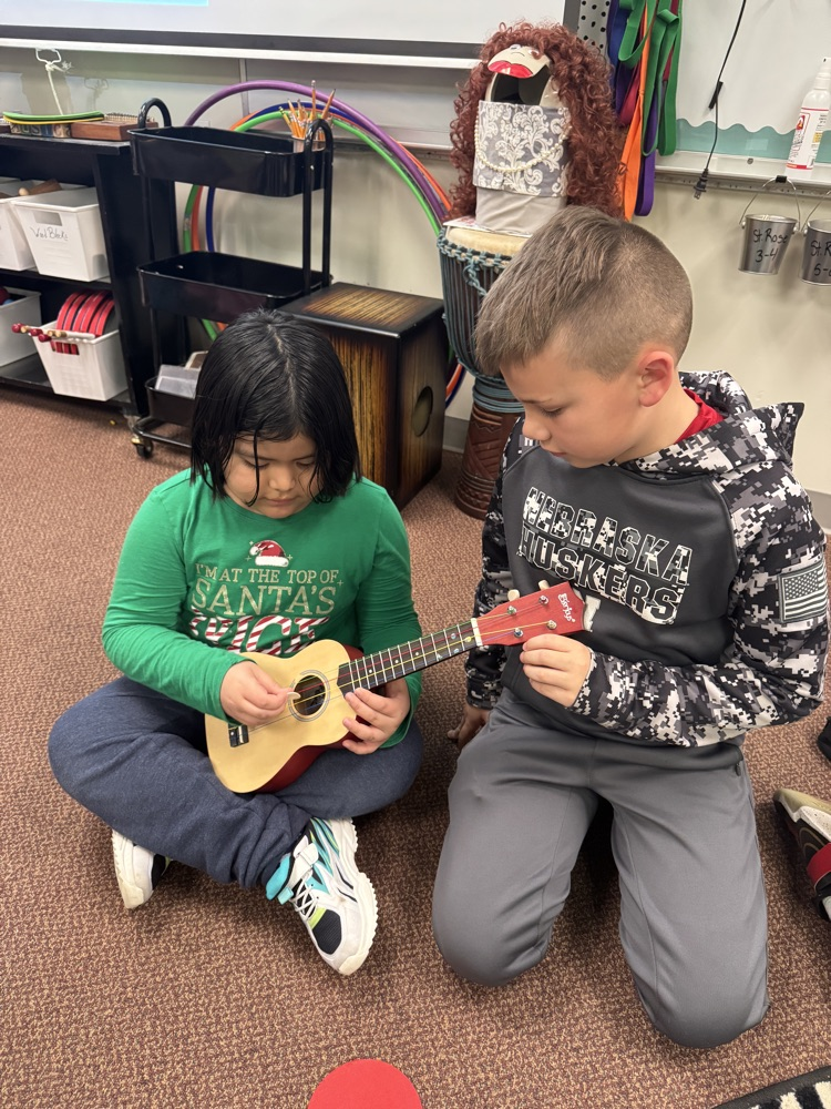 6th graders and Kindergarten students