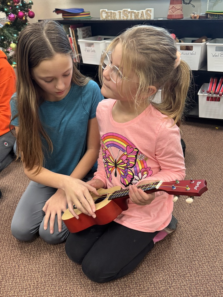 6th graders and Kindergarten students