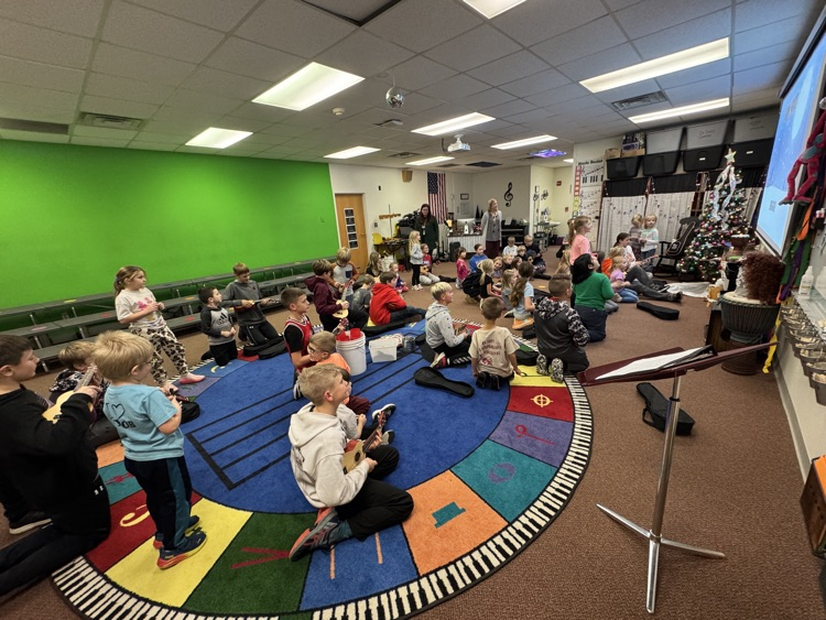 6th graders and Kindergarten students