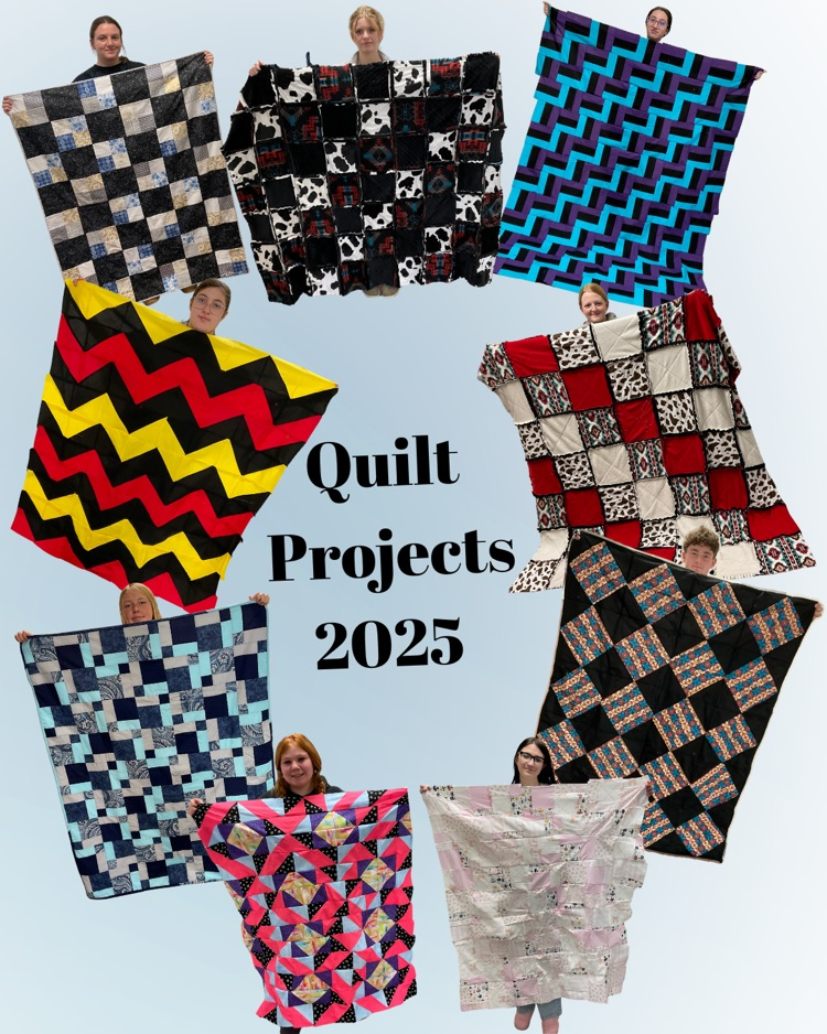 students holding quilt projects