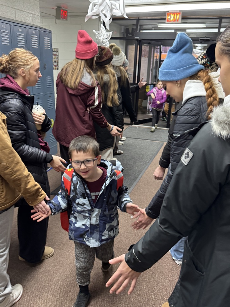 Team giving high fives 