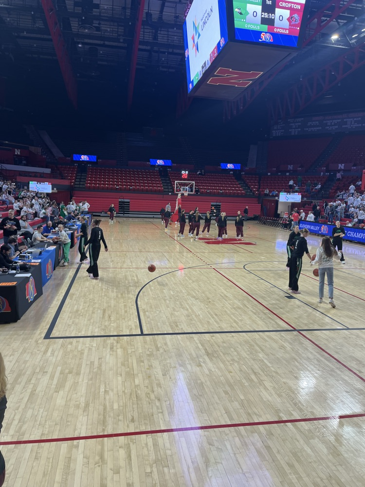 Girls basketball warming up 