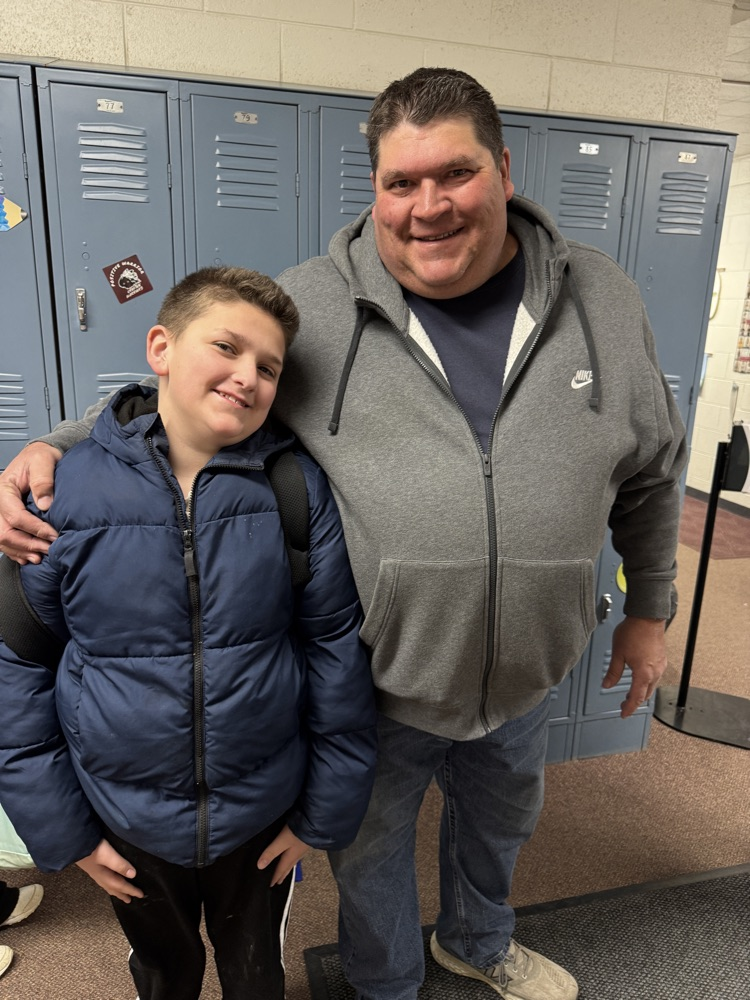 Mueller family smiling for a picture