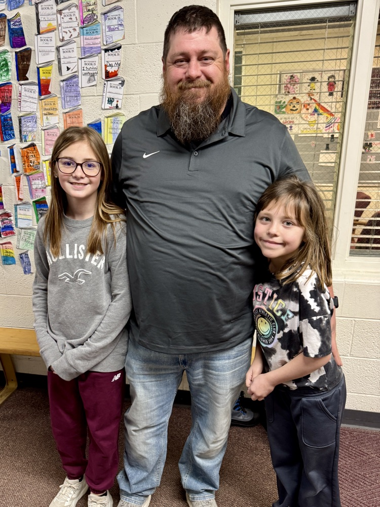Mueller family smiling for a picture