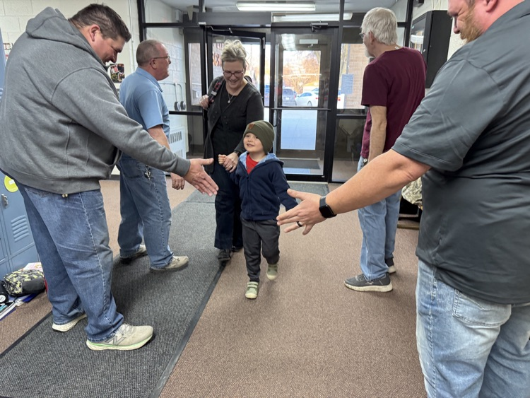 High Fives with the school janitors