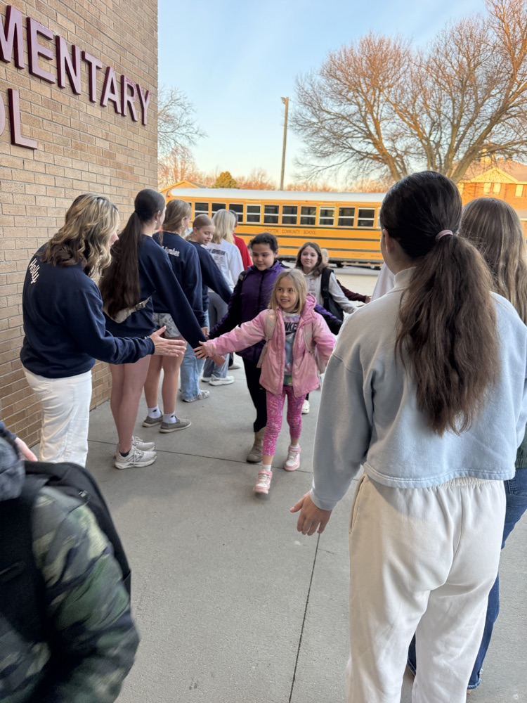 Crofton Speech Team giving High Fives 