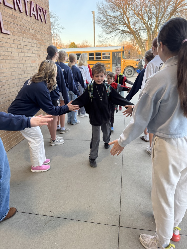 Crofton Speech Team giving High Fives 