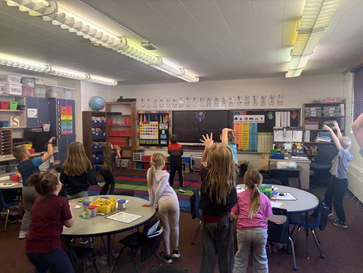 first graders doing a brain break
