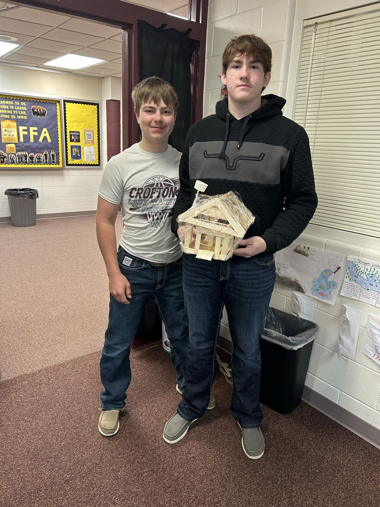 Students with completed model.