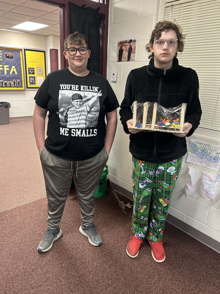 Students with completed model.