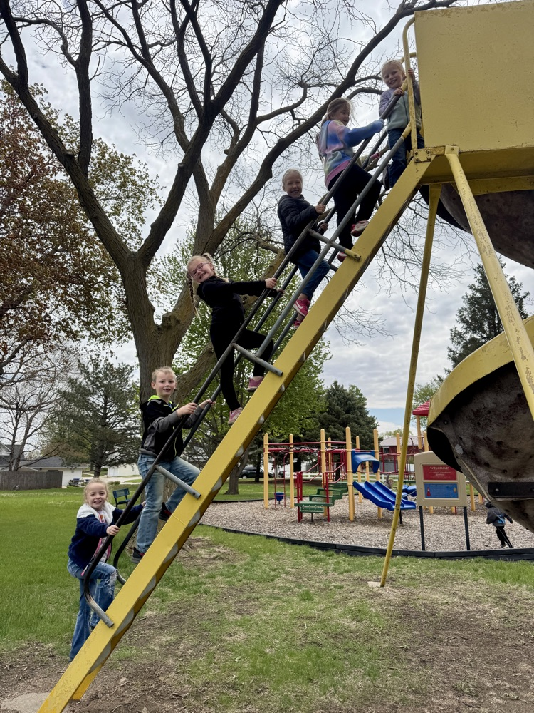 Kindergartners playing on the slide at Felber Park during lunch 