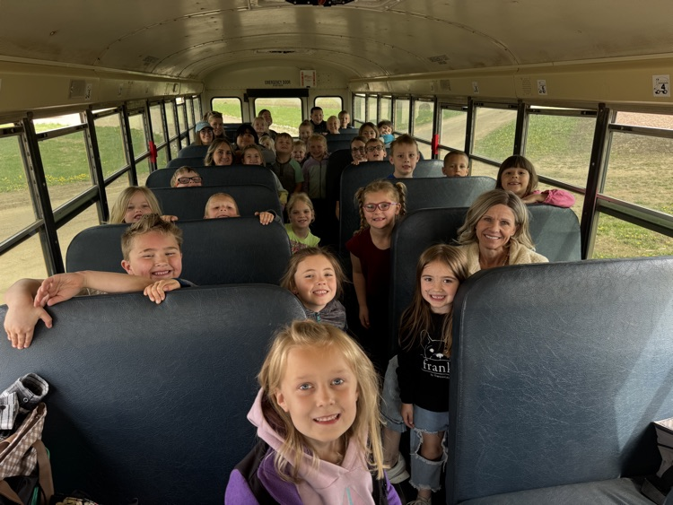 Kindergarteners on the bus for the field trip 
