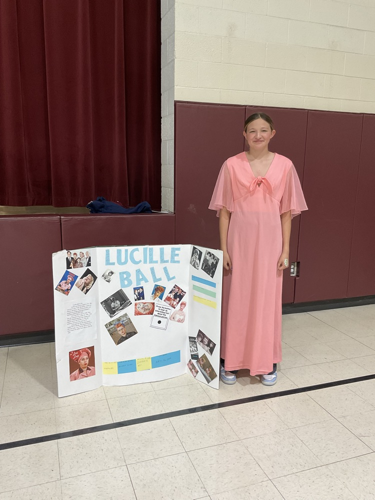 Sixth grade student dressed as a historical figure.