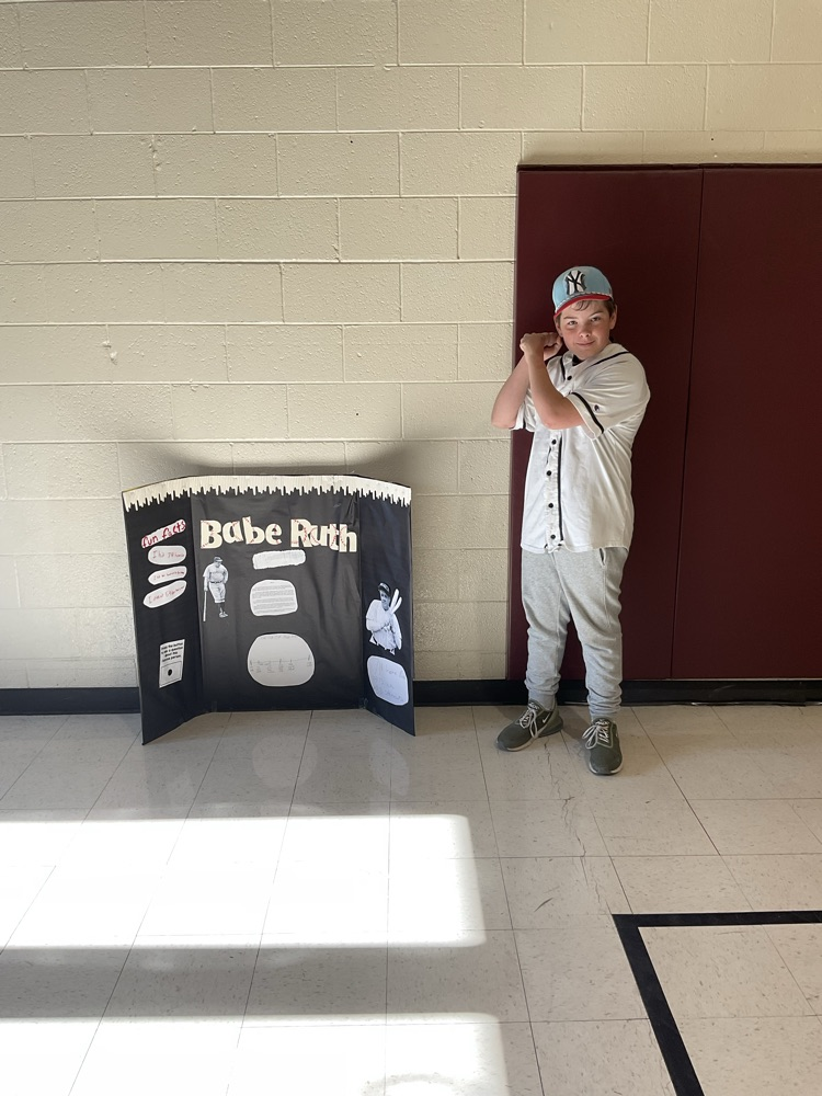 Sixth grade student dressed as a historical figure.