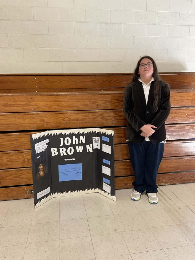 Sixth grade student dressed as a historical figure.