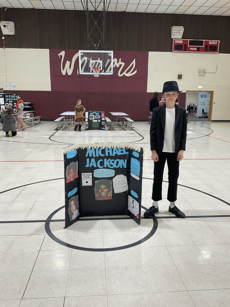 Sixth grade student dressed as a historical figure.