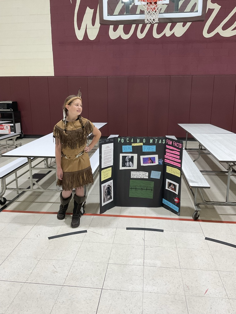 Sixth grade student dressed as a historical figure.