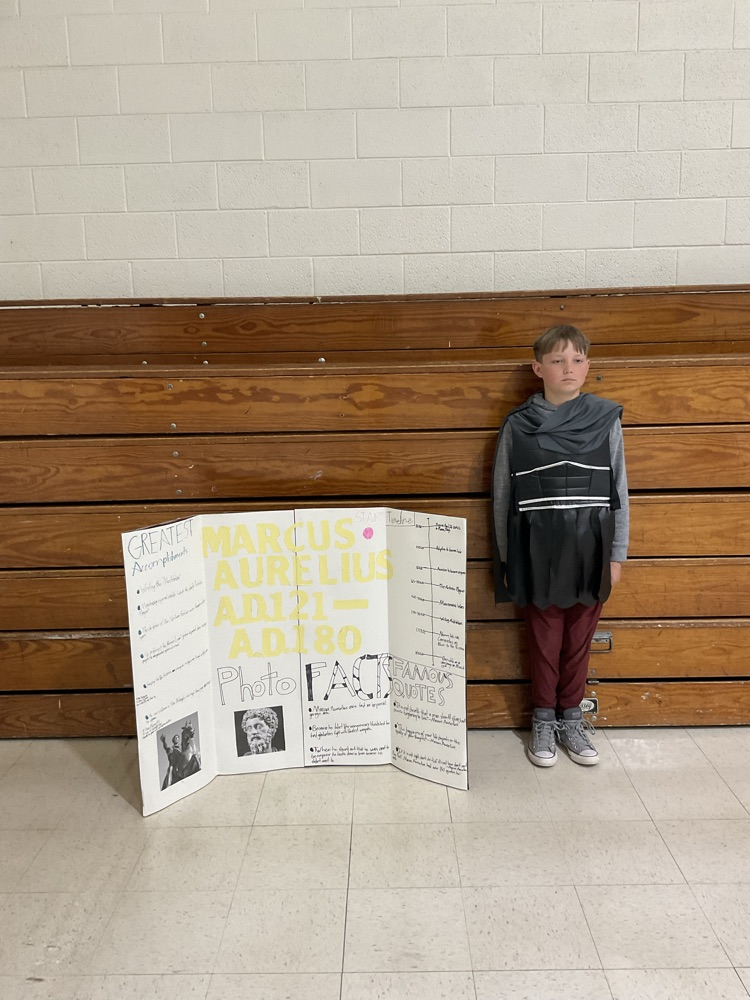 Sixth grade student dressed as a historical figure.