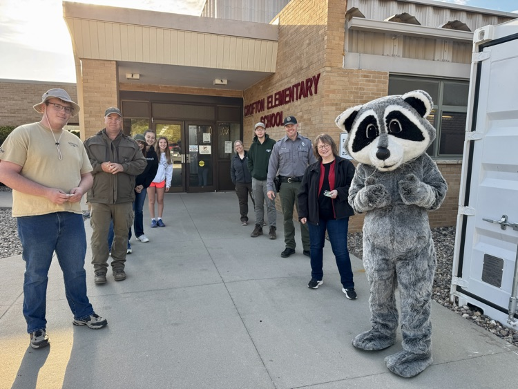 High Five Friday in front of the school with Lewis & Clark Recreation and Nebraska Game & Parks members