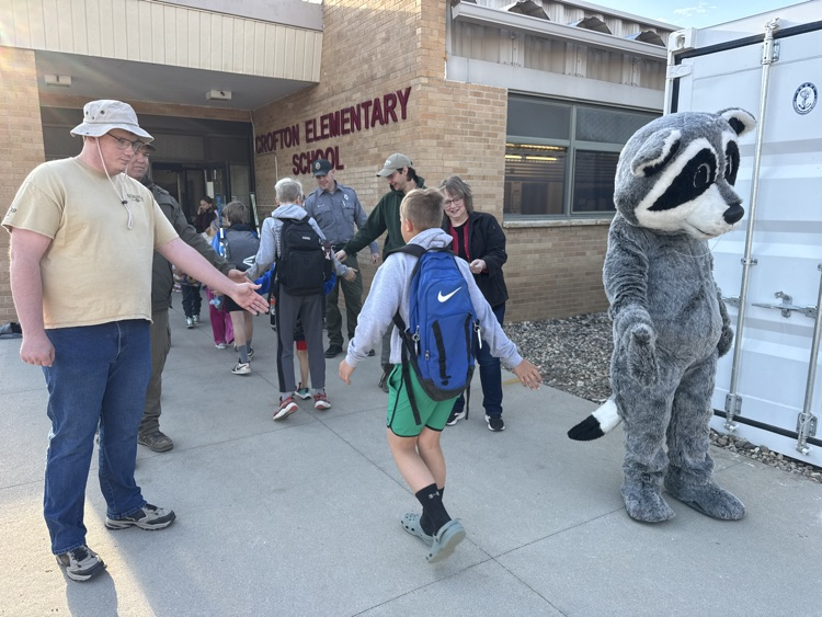 High Five Friday high fives with the students and Nebraska game & Parks 