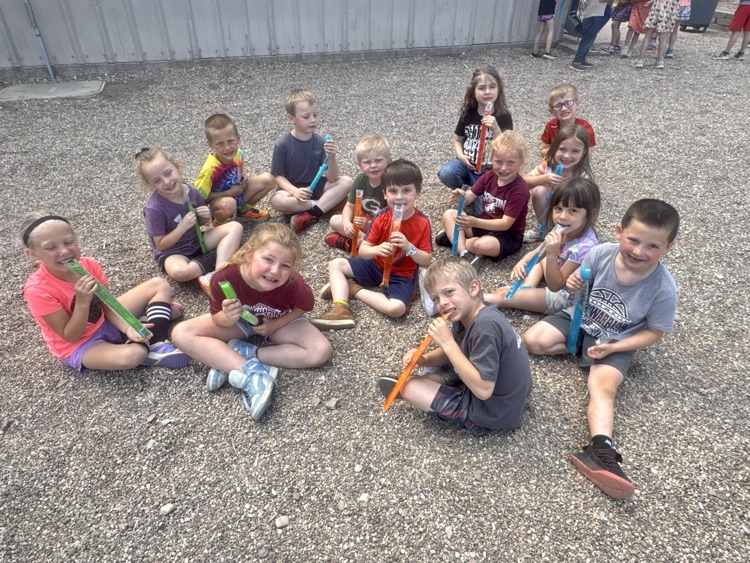 Kindergarteners enjoying some freezie treats 