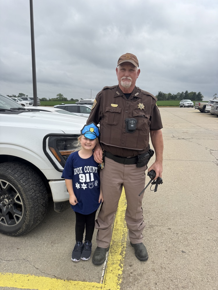 Deputy Krepel posing with his granddaughter